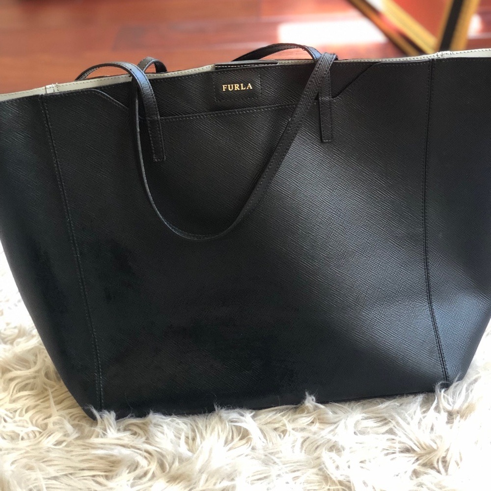 Authentic Furla tote handbag available.